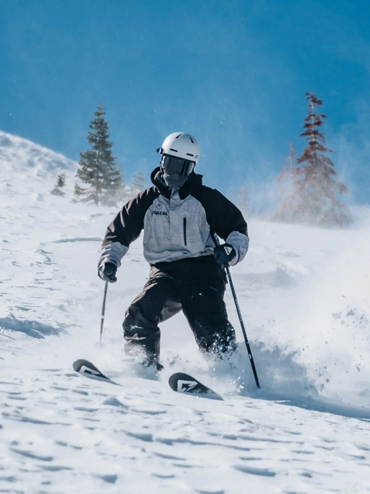 Skier skiing the powder at Soda Springs Resort in California near Truckee and Lake Tahoe